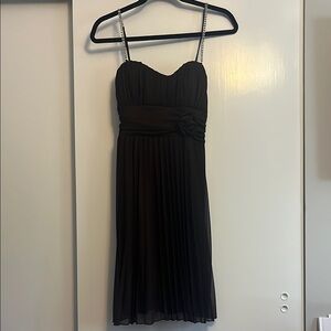 Brown pleated dress with rose and rhinestone details